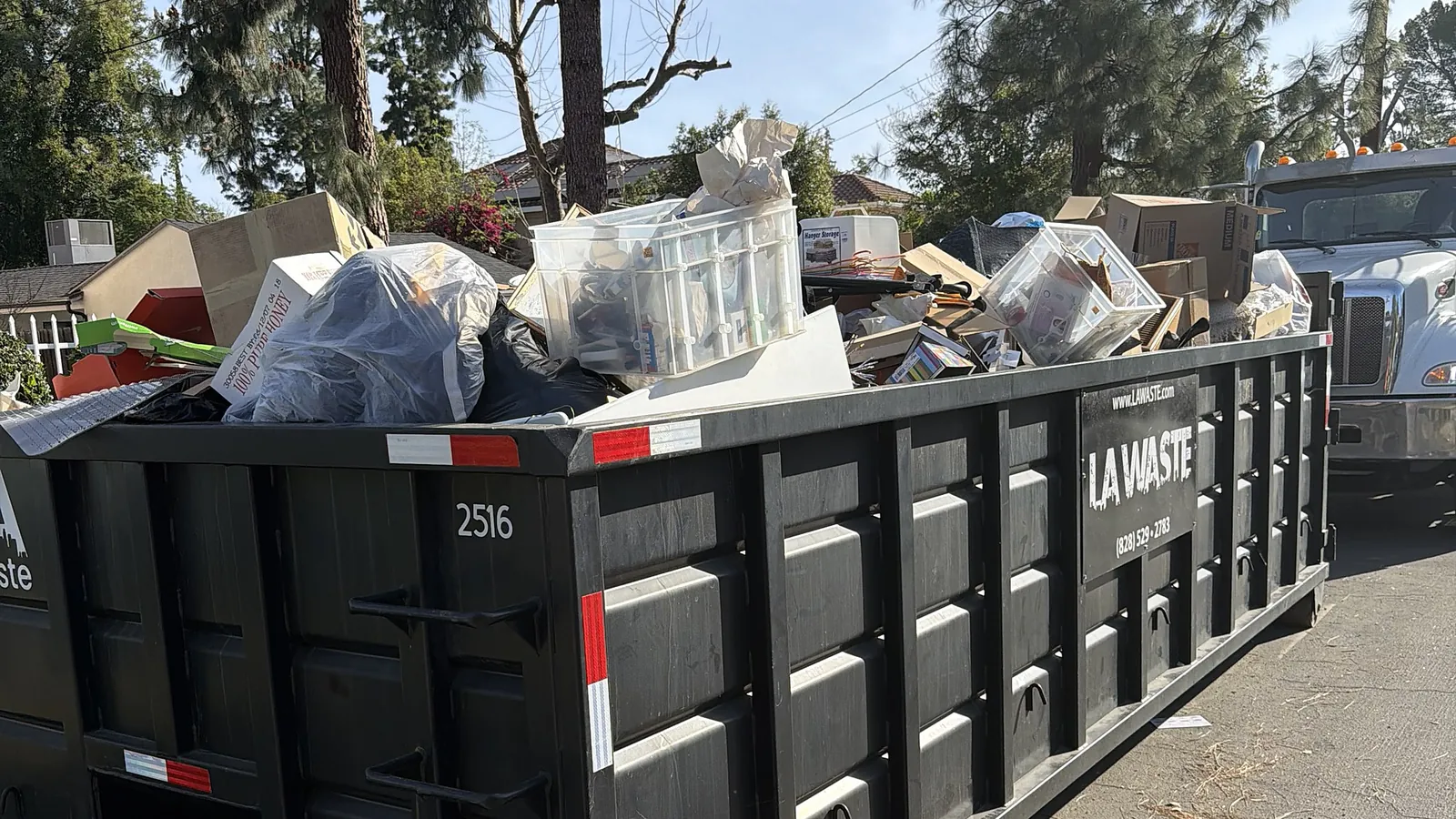 Full LA Waste 25 yard dumpster at a home cleanout