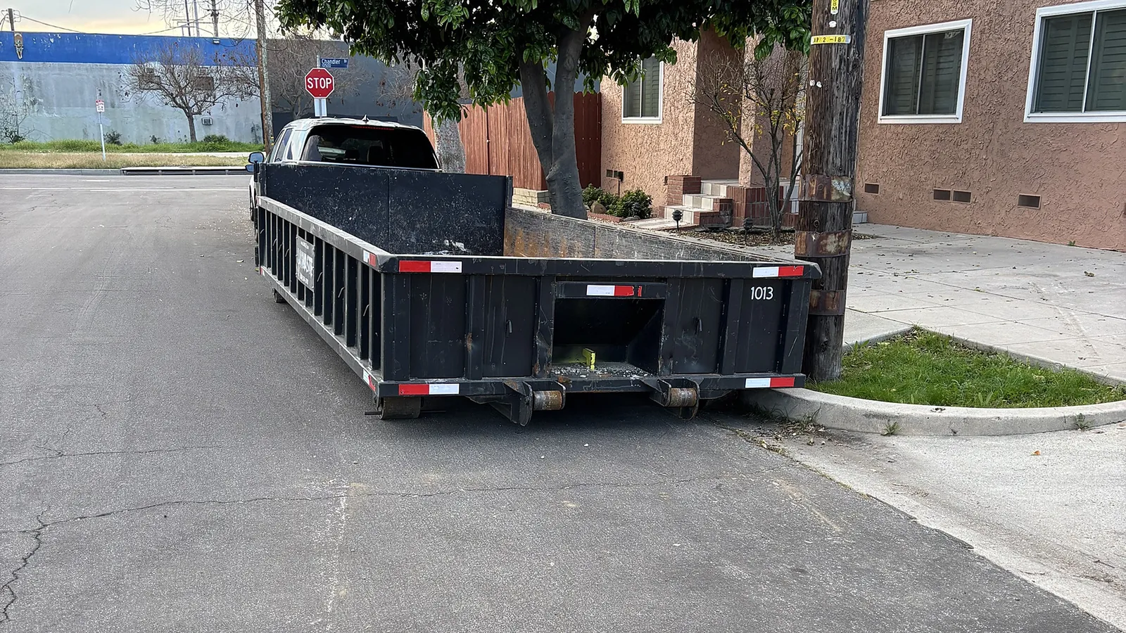 LA Waste 10 yard low boy dumpster placed curbside