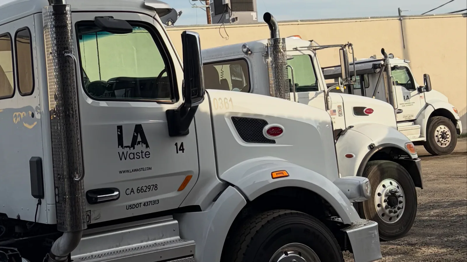 LA Waste Peterbilt roll-off truck fleet at the Van Nuys yard