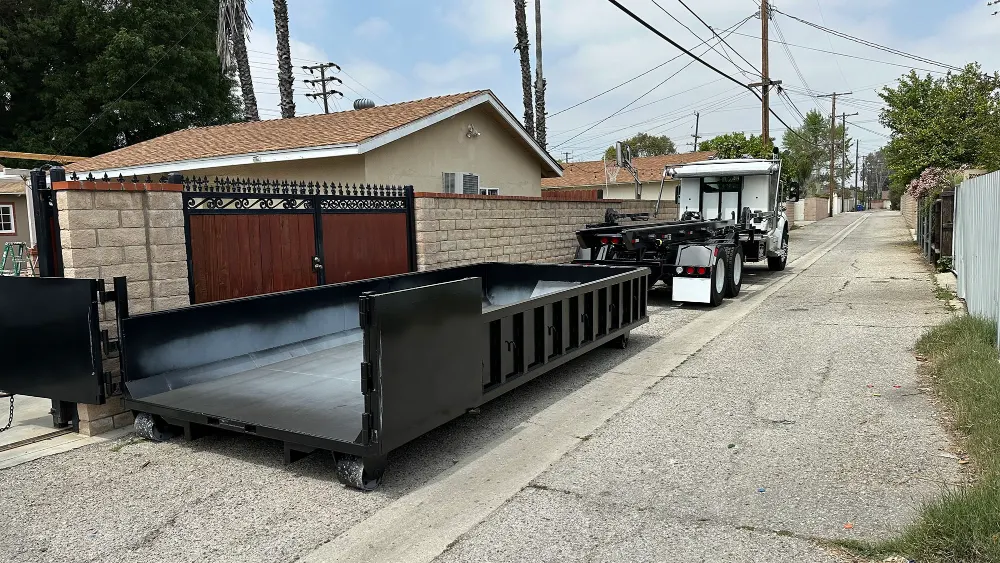 LA Waste roll-off truck delivering a dumpster in Los Angeles